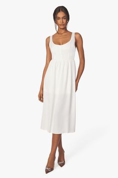 The Whisper White Corset Midi Dress will be your freshest closet staple this summer! Featuring a snug corset bodice and an A-line skirt, this sophisticated scoop neck dress gives off an effortlessly-chic look. Pair it with the Gracen Metallic Mule to elevate your look. Beautiful White Dresses, Corset Midi Dress, Romantic Summer, White Corset, Corset Bodice, Whisper White, Midi Slip Dress, White Midi, Scoop Neck Dress