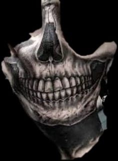 an image of a skull with a knife in it's mouth