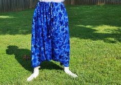 BayeFall Studio Harem Pants w/ Adjustable Waist Tie String & Pockets One Size Fits: S, M, L, XL, XXL, XXXL Men & Women This pair features a blue Tie Dye pattern. Blues/White. Spiritually crafted. Ships: Next Business Day (usually) Dropcrotch, Harem Pants, Aladdin, Chiya Pants, Injahaz, Samurai, Coat of Many Colors, Sacred Geometry Baggy Blue Bottoms For Festival, Indigo Full Length Bottoms For Summer, Blue Stretch Wide Leg Harem Pants, Blue Festival Pants With Elastic Waistband, Blue Wide Leg Harem Pants, Blue Pants With Elastic Waistband For Festival, Blue Wide Leg Pants For Festival, Blue Harem Bottoms For Summer, Blue Harem Bottoms With Elastic Waistband