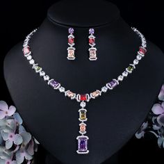 Complete your bridesmaid look with these exquisite accessories. The Royal Blue Cubic Zirconia Bridal Jewelry Set offers a stunning and glamorous appeal, perfect for adding a pop of color and sparkle to your ensemble. – This bridal a plus cubic zirconia gemstone necklace set is perfect for adding elegance to any bridal ensemble.– Made with high-quality materials, this set includes a stunning necklace and matching earrings for a complete look.– Perfect for pageant, bridal, bridesmaid, prom, qu... Prom Jewelry Sets, Bridal Party Dress, Drop Jewelry, Wedding Necklace Set, Costume Jewelry Sets, Jewelry Set Design, Necklace Bridal, Prom Jewelry, Fashion Jewelry Sets