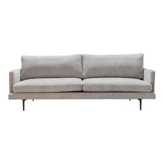 a gray couch sitting on top of a white floor