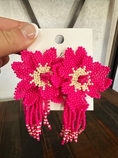 Add a pop of color to your wardrobe with the Pink Flower Fringe earrings. The intricate details and fun design make them perfect to dress up or down. They’re sure to be a conversation starter with their eye-catching style! 3” Lead and nickel free. Antique Candles, Pop Of Color, Fun Design, Fringe Earrings, Pink Flower, Beaded Flowers, Intricate Details, The Pink, Sales Gifts