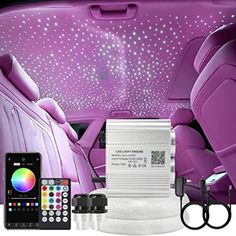 the interior of a car with lights and remote controls in front of it, along with other accessories