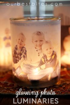 a candle with two children on it and the words glowing photos luminaires