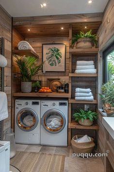 a washer and dryer in a room with wood paneling on the walls