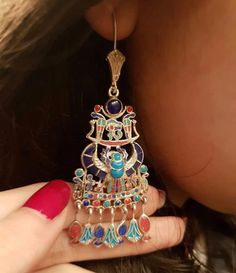 .Handmade Egyptian Silver Tutankhamun's Earring With Gemstones .Handmade by artists in Egypt .Weight Around 15 - 20 grams .Material: Sterling Silver 925 and Gemstone Tutankhamun, Slide Lock, Bib Necklaces, Silver Earring, Handmade Sterling Silver, Chain Styles, Silver 925, Egypt, Silver Earrings