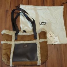 Ugg Shearling Shopper Tote In Chestnut With Dust Bag. It Has Been Used A Few Times. I Still Have The Tags. Purse Measurements Approx 15"W, 11"L And Has A 10" Handle Drop. The Purse Has Been Stored Away For Several Yrs And Not Used. There Is A Pocket On The Front, Outside Of The Purse And A Coin Purse On The Back. The Inside Is Divided By A Zippered Pouch. It Buckles Closed. Smoke Free, Dog Friendly Home. Condition Is Pre-Owned. Minor Wear Is To Be Expected. See Pictures Closely, And Buy Accordingly. Please Ask Questions Or Ask For Measurements/Additional Pictures Prior To Purchase. All Pictures Taken Are Of The Actual Item/Items. Any Measurements Are Approximate. Ugg Purse, Ugg Purses, Winter Purse, Fur Tote Bag, Winter Purses, Ugg Bag, Hobo Tote Bag, Fall Bags, Brown Fur