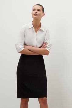 The Cobble Hill Skirt—Origami Suiting - Black | M.M.LaFleur Classic Relaxed Mini Skirt For Office, Modern Relaxed Fit Pencil Skirt For Work, Business Pencil Skirt With Lining, Modern Workwear Mini Pencil Skirt, Modern Pencil Mini Skirt For Workwear, Modern Pencil Mini Skirt For Work, Classic Lined Skirt For Business Casual, Classic Flowy Skirt For Office, Classic Pencil Skirt With Relaxed Fit