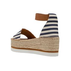 Experience the iconic style of See by Chloe with the Glyn Platform Espadrille in Dark Blue. Made with a durable rope platform and contrasting rubber outsole, these striped canvas espadrilles exude sporty sophistication. The adjustable leather strap ensures a perfect fit with every wear. Elevate your wardrobe with these must-have shoes!