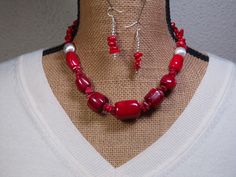 "Natural Untreated AAA Red Coral up to 20mm x 26mm Stem Slices, 925 Silver Beading and Clasp necklace and Earrings Handmade by me, \"Limpin' Lizard\". This Silver Hook and Eye Clasp necklace is 16 1/2\" inches long but can be made longer by three 3\" Silver Extension Chain or shorter if buyer prefers, no additional charge. Earrings are available with your choice of Silver Extended Drop posts, Silver French Wire Hooks ( as shown), Silver Leverback posts, Silver Hoops, or Clips if you do not have Red Sterling Silver Necklace With Matching Earrings, Ruby Beads, Silver Necklace Statement, Free Earrings, Coral Necklace, Emerald Necklace, Silver 925 Necklace, French Wire, Red Coral