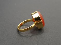 "Caroline Ring Gold, 925 Solid Sterling Silver Ring, 22K Yellow Gold Fill Ring, Orange Stone Ring, Gemstone Ring, Handmade Ring MORE CAROLINE RINGS>> https://www.etsy.com/in-en/listing/698449180/coroline-ring-natural-oval-coroline?ga_search_query=COROLINE&ref=shop_items_search_1&pro=1&frs=1 SHOP JEWELLERYVILLA> https://www.etsy.com/in-en/shop/jewelleryvilla FAST, FREE SHIPPING AND HANDLING TIME Handling Time: We take handling time of 3 Business Day from the date of receipt o Gold Rings With Carnelian Gemstone, Gold Carnelian Gemstone Ring, Gold Carnelian Ring For Wedding, Carnelian Gold Wedding Rings, Gold Carnelian Ring For Anniversary, Gold Carnelian Anniversary Rings, Orange Stone, Carnelian Ring, Gold Filled Ring