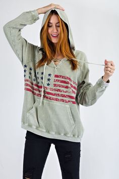 I love this vintage wash American Flag print. This is definitely a piece to wear all year long. Features are: -WASHED TERRY PULLOVER HOODIE-VINTAGE AMERICAN FLAG PRINT-LACED UP AT NECK-LOOSE FIT AND SLOUCHY SILHOUETTE-KANGAROO FRONT-BANDED CUFFS AND BOTTOM HEM True to size with a relaxed fit. Sizes: Small-Large 100% Cotton Vintage American Flag, American Flag Print, American Vintage, American Flag, Kangaroo, Pullover Hoodie, Love This, Loose Fitting, Flag