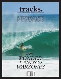 the front cover of tracks magazine featuring a surfer on a white surfboard riding a wave