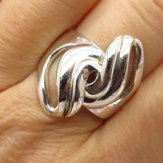 925 Sterling Silver Infinity Swirl Design Ring Size 8Weight: 9.2gWELCOME TO PAWN SHOPWe are an actual pawn shop and have been in business for over 25 years.Since 1990, our establishment has been serving a variety of clients by providing them with short term cash solutions and options of liquidity regarding their treasured heirlooms.Acknowledging that today′s customers are very sophisticated and are looking for a variety of investments, our acquisitions are hand-picked for our special clientele. Modern Silver Bypass Ring For Anniversary, Silver Spiral Ring For Anniversary, Silver Spiral Anniversary Ring, Modern Twist Silver Bypass Ring For Anniversary, Modern Twist Silver Bypass Ring, Silver Swirl Rings For Anniversary, Sterling Silver Swirl Jewelry Gift, Cheap Nickel-free Swirl Jewelry, Silver Infinity Ring With Polished Finish