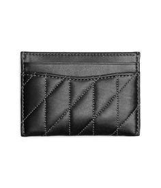 Please Note: COACH™ items cannot be shipped to military addresses (APO or FPO) and addresses in Hawaii, the Virgin Islands, Guam or any other locations outside of the continental US..Keep your cards stored while maintaing a classy vibe with the COACH™ Quilted Pillow Leather Essential Card Case which comes with a streamlined compartment and four external pockets. The quilted pattern and brand logo elevate the appeal..Leather construction..Polyester lining..Imported..Measurements: Height: 2 1/1 in Classic Coach Card Holder For Travel, Classic Coach Rectangular Card Holder, Coach Rectangular Card Holder With Coin Pocket, Classic Coach Card Holder For Everyday Use, Coach Bifold Card Holder With Interior Slots, Classic Coach Card Holder, Luxury Coach Card Holder With Card Slots, Classic Coach Bifold Card Holder, Classic Coach Card Holder With Coin Pocket