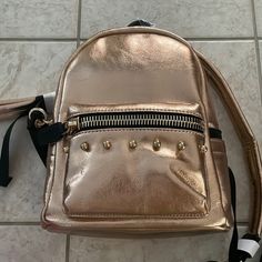 Nwt Brand New Never Worn Dream Control Mini Backpack. Casual Gold Bags With Zipper Closure, Trendy Gold Satchel For On-the-go, Gold Backpack For Daily Use, Gold Standard Backpack For Everyday Use, Everyday Gold Standard Backpack, Trendy Gold Bag For School, Gold Everyday Backpack, Casual Gold Bag For School, Casual Gold School Bag