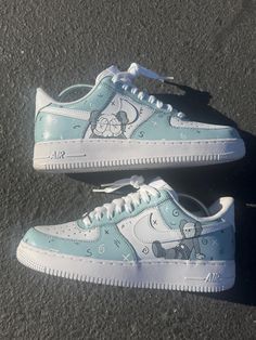 These custom Kaws-inspired Air Force 1 sneakers feature a stunning Prelude Gray and white color scheme with intricate hand-painted Kaws graphics. The iconic Companion character is showcased in detail, blending effortlessly with the swirling abstract designs and signature 'X' motifs across the shoes. Made with precision and creativity, these one-of-a-kind kicks offer a unique blend of street art and high fashion, perfect for sneakerheads and art lovers alike. White Sneakers With Graffiti Print For Sports, White Lace-up Sneakers With Custom Artwork, Artistic White Custom Sneakers For Streetwear, White Low-top Graffiti Sneakers, White Sporty Sneakers With Graffiti Print, Sporty White Sneakers With Graffiti Print, White Low-top Sneakers With Graffiti Print, White Hand Painted Lace-up Sneakers, Hand Painted White Low-top Custom Sneakers