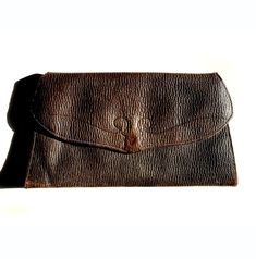 "Vintage Art Deco Leather Clutch/Purse/Handbag,Vintage Leather Clutch/Purse,Leather Clutch/Purse/Handbag,Vintage Art Deco Clutch/Handbag This is a beautiful, Vintage, Leather Clutch which looks to be from the Art Deco era. There is a coin purse stitched inside with a zippered middle section. It has a hand strap in the back to slide your hand into to hold. The clutch measures 10\" at the bottom to 8\" wide at the top and it's 5\" wide. It is a vintage piece so there is some wear from age. This is a really cool looking clutch." Vintage Leather Pouch For Travel, Vintage Leather Pouch With Coin Pocket, Vintage Travel Wallets With Coin Pocket, Vintage Travel Wallet With Coin Pocket, Vintage Pouch Clutch For Everyday Use, Vintage Satchel Clutch For Everyday Use, Vintage Brown Wallets With Leather Lining, Vintage Brown Wallet With Leather Lining, Vintage Brown Leather Clutch