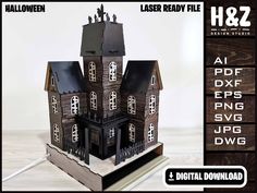 a paper model of a house on a stand with text below it that reads laser ready file