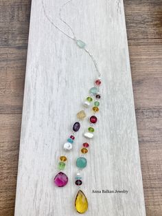 I have re-imagined the traditional Lariat and added a clasp to affix it at your desired length. Plus, it will never come undone. Practical reasoning aside, this is a fun Summer inspired mixed shapes Lariat. The main gems are Aqua Chalcedony, Ruby Qz, Amethyst, Sunny Color Citrine, plus other colors and Pearls. Sterling silver, drapes at 28” Try pairing this style with my Lily Mini Hoops or Eve Stick Earrings to complete a fashionable look. Stick Earrings, Colorful Life, Come Undone, Aqua Chalcedony, Colorful Jewelry, Fun Summer, Lariat Necklace, Other Colors, Tassel Necklace