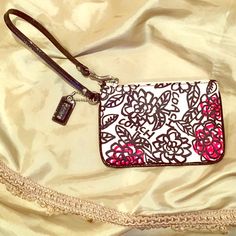 Coach Wristlet It Black White Pink And Red With Floral Design. Never Used. Trendy Coach Wristlet As Gift, Trendy Coach Clutch As Gift, Elegant Pink Coach Wristlet, Trendy White Pouch Wristlet, Elegant Pink Wristlet With Zipper Pouch, Trendy Coach Clutch Wristlet, White Zipper Pouch Wristlet, White Clutch Wristlet With Wrist Strap, White Wristlet Clutch With Wrist Strap