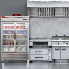 an industrial kitchen with stainless steel appliances and refrigerators