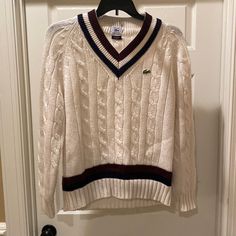 Vintage 80’s Izod Lacoste Men’s Tennis Sweater. This Piece Is Flawless Other Than The Fuzzies From The Wool. A Truly Classic Piece To Add To Your Collection. Open To Offers Luxury White V-neck Polo Sweater, Lacoste Sweater, Mens Lacoste, Tennis Sweater, Izod Lacoste, Lacoste Men, Colorful Sweaters, Tennis, Men Sweater