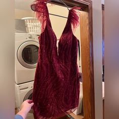 Color Is Listed As Burgundy Holiday Wedding Mini Dress With Sweetheart Neckline, Burgundy Prom Season Dress, Burgundy Cocktail Dress For Prom Season, Red Homecoming Gown, Burgundy Dresses For Prom Season, Glamorous Red Homecoming Gown, Glamorous Red Gown For Homecoming, Sleeveless Fitted Holiday Dress For Wedding, Fitted Sleeveless Holiday Dress For Wedding