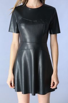 Gorgeous and fitted, zipper back faux leather. 55%polyester/45%pleather Edgy Dresses With Back Zipper, Fitted Leather Dress With Edgy Style, Black Fitted Leather Dress, Fitted Black Leather Dress, Fitted Leather A-line Dress, Edgy Leather Dresses, Fitted A-line Leather Dress, Fitted Faux Leather Edgy Dress, Edgy Fitted Faux Leather Dress