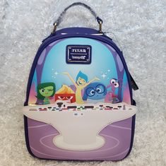 a purple and blue backpack with cartoon characters on it