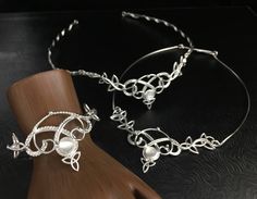 I will fabricate this complete romantic and Renaissance, boho inspired bridal set, in sterling silver, with a feminine and Celtic take on some Irish classic designs! I make everything in sterling silver, at my bench studio, and each piece is forged and fabricated one-at-a-time, by my hand only...nothing is pre-manufactured or made elsewhere! So, because of this, please allow me proper time to complete the set and ship in plenty of time for hair trials, etc. as I want to ensure I am not rushed an Elegant Silver Adjustable Bridal Sets, Elegant Adjustable Silver Bridal Sets, Artisan Adjustable Wedding Jewelry, Artisan Adjustable Jewelry For Wedding, Bohemian Silver Jewelry For Wedding, Ceremonial White Artisan Jewelry, White Artisan Jewelry For Ceremonial Occasions, Artisan White Jewelry For Ceremonial Occasions, Spiritual Sterling Silver Jewelry For Wedding