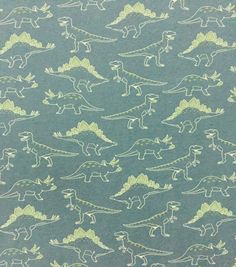 a blue background with green and white dinosaurs on it