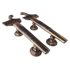 two antique style door handles and knobs