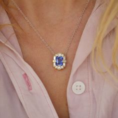 Item Details: One natural blue sapphire, intense blue weighing approx. 3.00 ctw. Sixteen natural baguette, carré, and round brilliant cut diamonds weighing approx. 0.60 ctw, F color VS clarity. Set in 14k yellow gold. Chain is 14K white gold with stations at 16” and 18”, 1.3mm cable chain. This necklace was custom created with one-of-a-kind stones. Email custom@berlingerrings.com to create a similar necklace. Enquire Design a custom piece with us Sapphire Diamond Pendant, Diamond Mosaic, Sapphire Pendant, Gemstone Jewellery, Bar Pendant, Yellow Gold Chain, Natural Blue Sapphire, Sapphire Diamond, Round Brilliant Cut Diamond