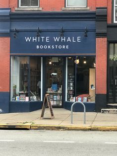 the storefront of white whale bookstores is empty