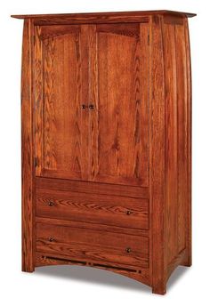 the armoire is made from wood and has two drawers