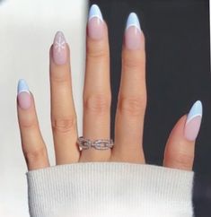 Light Blue French Tips With Snowflakes, Winter French Tip Acrylic Nails, Powder Blue Winter Nails, Almond Blue Christmas Nails, Winter Themed Nails Simple, Christmas Nails Snowflake Blue, Simple Snowflake Nails Blue, Winter Nails Light Blue And White