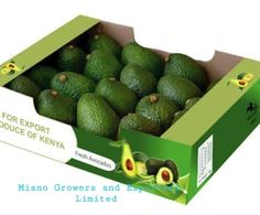 an open cardboard box filled with lots of green avocados