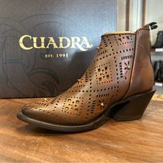 Cuadra Ankle Boot Genuine Bovine Leather Geometric Design With Metallic Applications New In Box Western Style Mid-calf Boots With Square Toe For Winter, Square Toe Boots Cowgirl Ariat, Western Fitted Mid-calf Boots With Square Toe, Brown Mid-calf Boots With Reinforced Heel And Square Toe, Miz Mooz Boots, Womens Wedge Boots, Born Boots, Western Brown Mid-calf Boots With Square Toe, Kitten Heel Ankle Boots