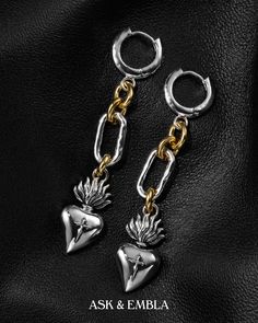 Forged in silver and gold for creed and glory, wear the Sacrament Earrings for divine revelations in every sway.

Bear the sacred emblem at the link above. Spiritual Oxidized Dangle Jewelry, Spiritual Style Single Dangle Earring, Silver Spiritual Earrings For Rituals, Spiritual Metal Drop Earrings, Divine Revelation, Studs Earrings, Halloween Sale, Online Jewelry Store, Silver And Gold