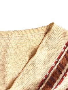 Details: Authentic 70's fitted sweater Fits like a Women's Small Small hole at shoulder on the back (see image 4 for details) Retro Stretch Knit Sweater, Retro Knit Stretch Sweater, Retro Fall Sweater, Retro Cotton Sweater For Fall, Vintage Long Sleeve Stretch Sweater, Retro Cotton Beige Sweater, Retro Cotton Sweater Vest For Fall, Vintage Sweater Vest For Fall, Vintage Brown Sweater Vest For Fall