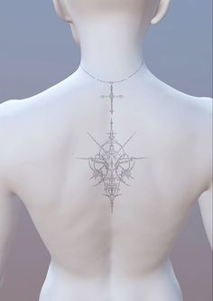 the back of a woman's neck with an intricate design on it