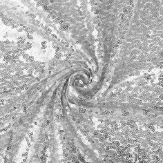 an abstract black and white photo with swirls in the center, as seen from above