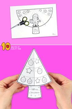 someone is making a christmas tree out of paper with scissors and glue on the top