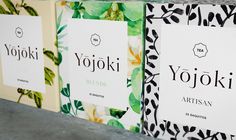 three boxes of yojiki tea are lined up on the shelf next to each other