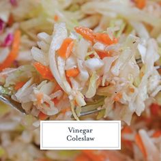 a spoon full of coleslaw and carrots with the words vinegar coleslaw on it