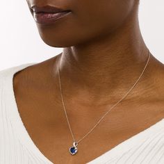 Gift her a charming and elegant symbol of your love with this heart-shaped blue lab-created sapphire and diamond accent pendant. Crafted in cool 10K white gold This look glistens with a 7.0mm heart-shaped bright blue lab-created sapphire. A diamond-accented ribbon loops around the center stone and artfully forms the twist bail above. Blue sapphire is the traditional birthstone for September and symbolizes truth, sincerity and commitment. The pendant suspends along an 18.0-inch rope chain that secures with a spring-ring clasp. Elegant Symbol, Sapphire Diamond, Rope Chain, Bright Blue, Spring Rings, Blue Sapphire, Birthstone, Heart Shapes, Sapphire