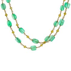 A lovely Emerald beads necklace featuring yellow diamond beads throughtout. Finely crafted in 18K yellow gold. This is truly a special Emerald necklace to add to your jewelry collection, may be worn to add a lovely pop of color for a casual or tailored look. Gold Emerald Necklace With Round Beads, Gold Emerald Necklace With Round Beads Single Strand, Elegant Gold Beaded Emerald Necklace, Elegant Gold Emerald Necklace With Faceted Beads, Luxury Yellow Gold Necklaces With Gemstone Beads, Elegant Yellow Round Bead Necklaces, Elegant Gold Emerald Necklace With Polished Beads, Elegant Yellow Faceted Necklaces, Yellow Gold Briolette Necklaces With Faceted Beads