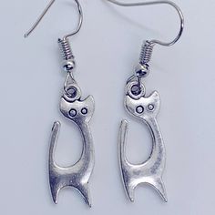 Super Cute Handmade Antiqued Silver Cat Earrings! Hand Crafted From High Quality Materials And Hypoallergenic 925 Silver Posts. New With Tags!!! These Adorable Earrings Are Lovingly Handmade By Me And My Small Design Label “Moon And Vine Design” In The Pacific Northwest Using High Quality Materials Sourced Locally Or Found During Travels. Lightweight To Wear And Easy To Match With Your Favorite Outfit! Dress These Earrings Up For A Party .Or Just Wear Them To The Office With Your Favorite Office Casual Metal Earrings With Ear Wire, Adjustable Cat Ears Earrings As Gift, Adjustable Cat Ears Earrings For Gift, Nickel-free Casual Party Earrings, Casual Adjustable Nickel-free Earrings, Cute Handmade Metal Earrings, Trendy Cat Ears Earrings For Gift, Casual Nickel-free Earrings For Party, Trendy Cat Ears Earrings As Gift