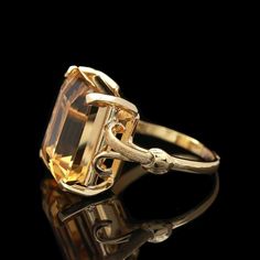 Vintage 18k Yellow Gold & Citrine Cocktail Ring - Etsy Elegant Yellow Gold Emerald-cut Topaz Ring, Elegant Emerald Cut Yellow Gold Topaz Ring, Elegant Yellow Gold Emerald Cut Topaz Ring, Luxury Citrine Topaz Ring With Emerald Cut, Luxury Yellow Gold Octagon Topaz Ring, Art Deco Gold Baguette Cut Ring, Gold Art Deco Baguette-cut Ring, Yellow Gold Citrine Topaz Ring, Emerald Cut, Elegant Octagon Citrine Rings